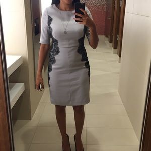 Classy short sleeved dress with lace on the sides